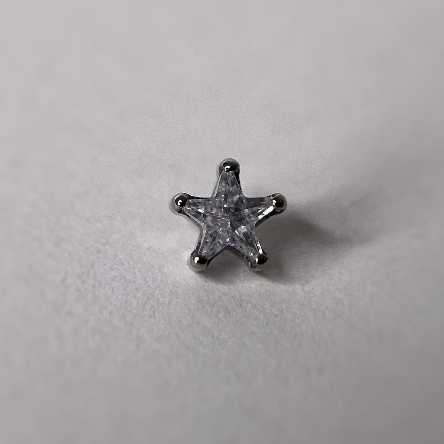 Stella con zircone