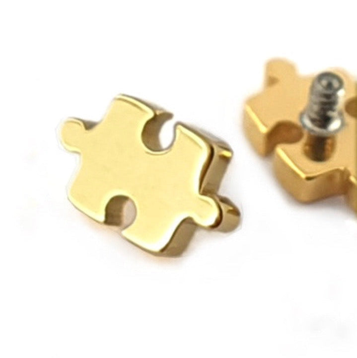 Puzzle in titanio (Gold PVD)