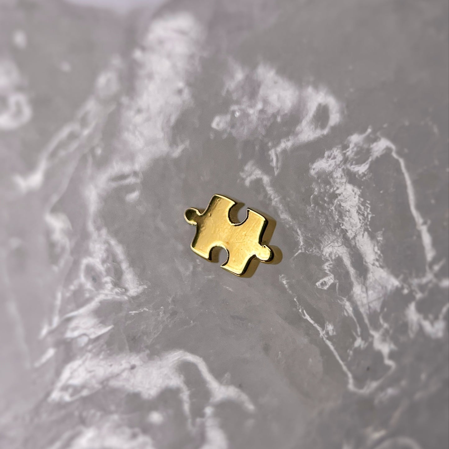 Puzzle in titanio (Gold PVD)