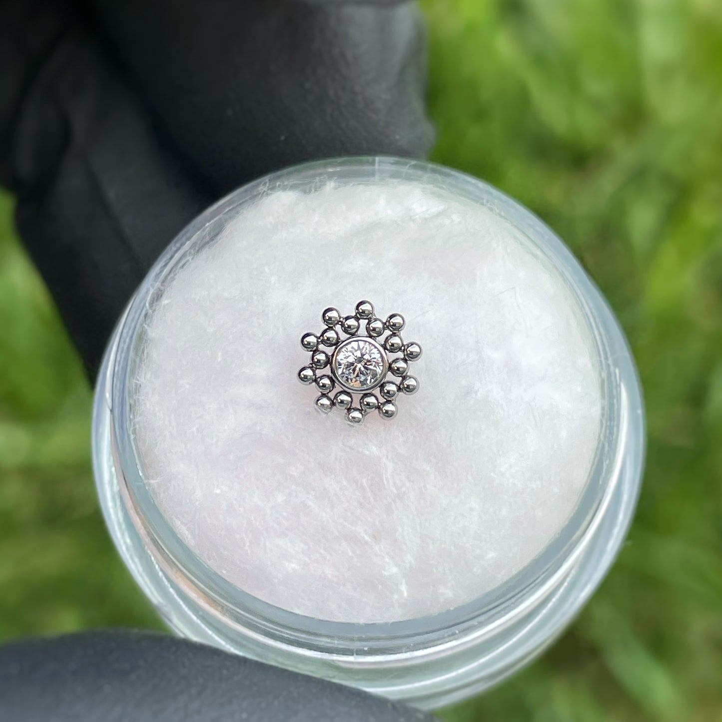 Sun con zircone