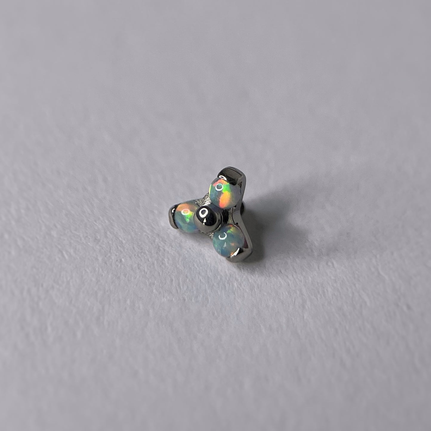 Trio con pietre opalescenti