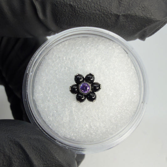 Fiore in titanio con petali onice e zircone CZ viola centrale