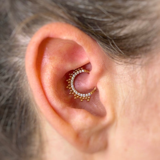 Anello Clicker in Titanio (Gold PVD) e zirconi CZ